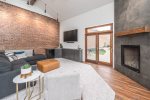 Upper Living Area with TV, Fireplace, Wet Bar, Rooftop Terrace